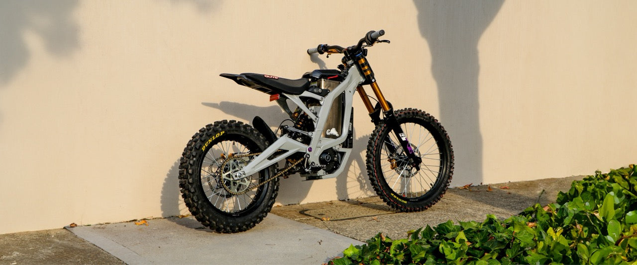 Custom Built Grey Surron bike with high performance power, wheel and brake upgrades